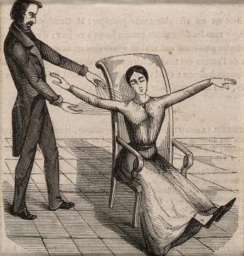 A mesmerist using animal magnetism on a woman who responds with convulsions. Wood engraving, 1845.