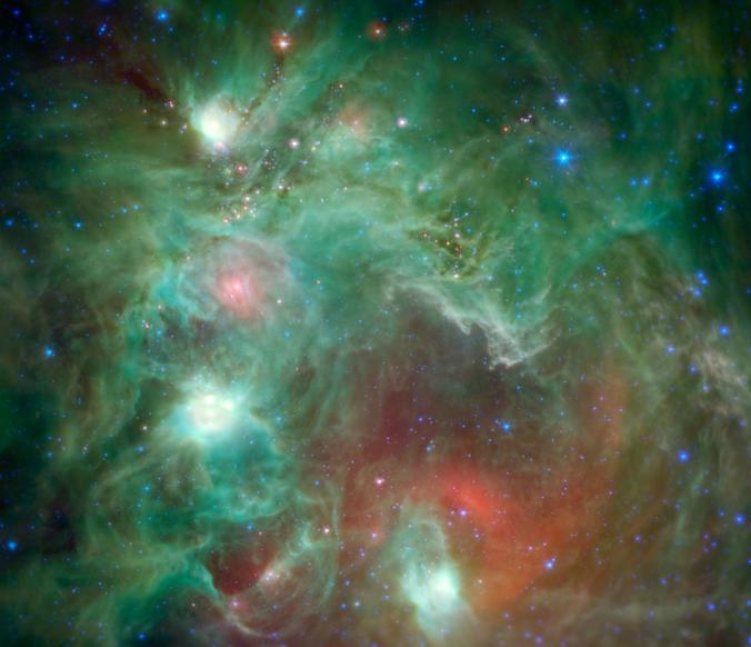 NGC 2174, nicknamed the Monkey Head, is about 6,400 light-years away from Earth. Taken with the Spitzer Space Telescope, the reddish spots show us the stars that will be born within the next millenium.
